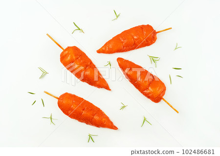 Fresh raw marinated chicken meat skewers iner fillet on a white background.Top view.Copy space. 102486681