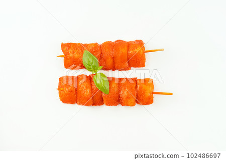 Chicken breast Fillets.Raw marinated chicken fillet skewers on a white background.Marinated Fresh.Closeup of chicken meat.Procurement for designers.Chicken fillet inner skewers.Food concept.Top view. Chicken breast Fillets.Raw marinated chicken fillet skewers on a white background.Marinated Fresh.Closeup of chicken meat.Procurement for designers.Chicken fillet inner skewers.Food concept.Top view. 102486697