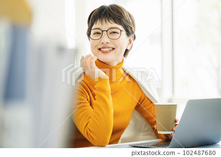 Very short fashionable career woman 102487680