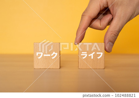 Hand choosing a block written life 102488821