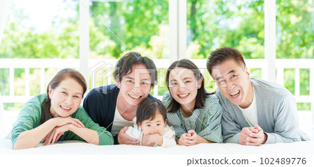 Three generation family portrait 102489776