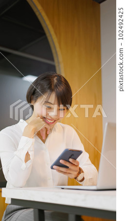 asian happy businesswoman working 102492425