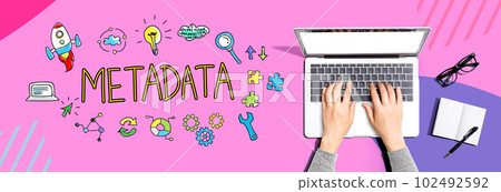 Metadata with person using a laptop 102492592