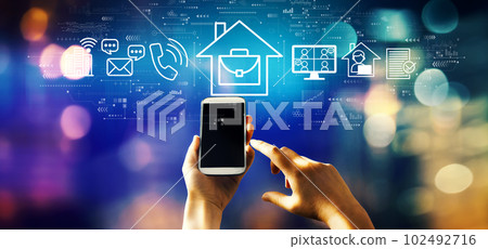 Telework theme with person using smartphone Telework theme with person using smartphone 102492716