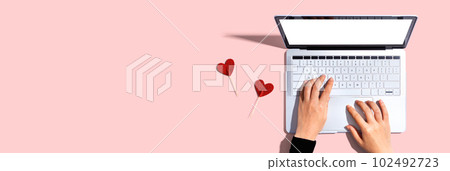 Laptop computer with heart cushions Laptop computer with heart cushions 102492723