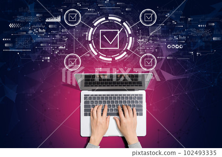 Checklist concept with person using laptop 102493335