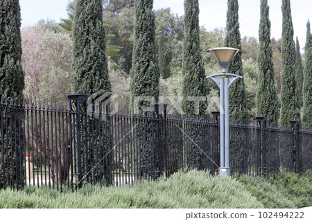 fence in a city park in northern Israel fence in a city park in northern Israel 102494222