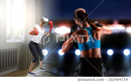 Young woman boxing in VR glasses Young woman boxing in VR glasses 102494734