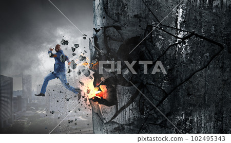 Determined businessman on his way to success leaving fire trails Determined businessman on his way to success leaving fire trails 102495343