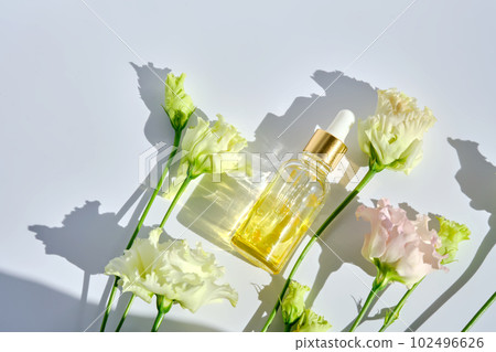 Serum with yellow petals and delicate flowers. Serum with yellow petals and delicate flowers. 102496626