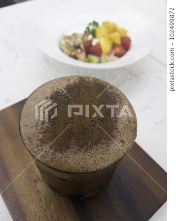 Dark chocolate latte in glass refreshment beverage drink 102499872