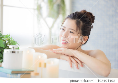 Female beauty Young woman taking a bath Female beauty Young woman taking a bath 102501408