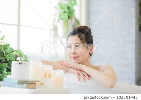 Female beauty Young woman taking a bath Female beauty Young woman taking a bath 102501443