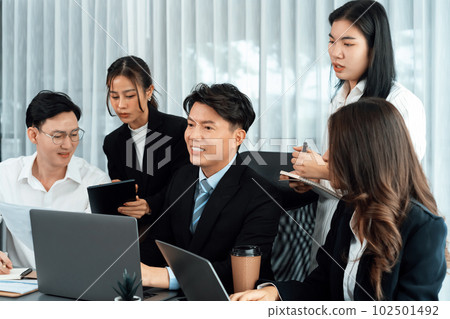 Office worker and manager analyze financial report paper in harmony workplace. 102501492