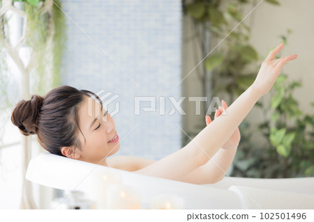 Female beauty Young woman taking a bath Female beauty Young woman taking a bath 102501496