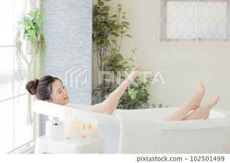 Female beauty Young woman taking a bath 102501499