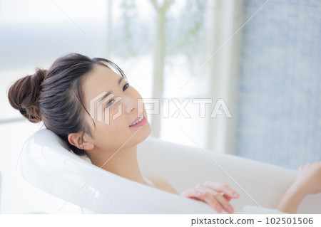 Female beauty Young woman taking a bath Female beauty Young woman taking a bath 102501506