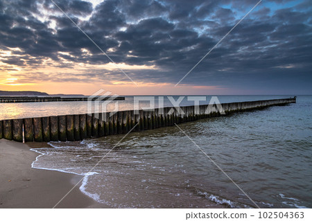 Beach of Baltic sea in Svetlogorsk at sunset. Kaliningrad region. Russia 102504363