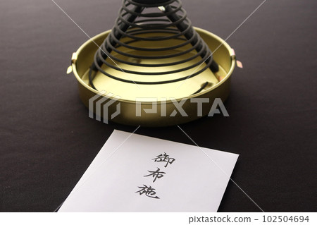 Burning incense and offering envelopes at the Chuindan Funeral image of funeral costs Burning incense and offering envelopes at the Chuindan Funeral image of funeral costs 102504694