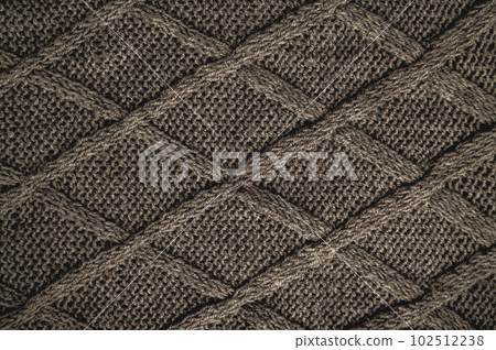 Handmade knit background with detail wool threads. Handmade knit background with detail wool threads. 102512238