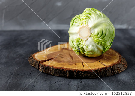 Fresh raw whole cabbage on black table. Organic healthy food. Copy space 102512838