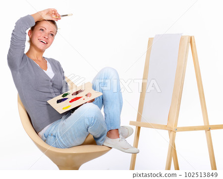 Woman, painting and happy with art canvas in studio for creativity and talent with paint brush for color. Female artist or painter isolated on a white background for creative work and mockup idea 102513849