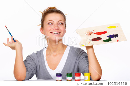 Art, painting and thinking with happy woman in studio with creativity, talent and paint brush for color. Female artist or painter isolated on a white background for creative work and idea for palette 102514536