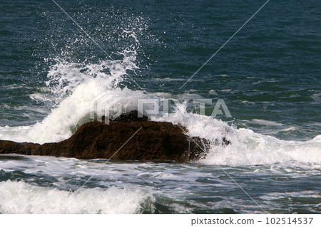 stones on the shores of the Mediterranean Sea in northern Israel 102514537