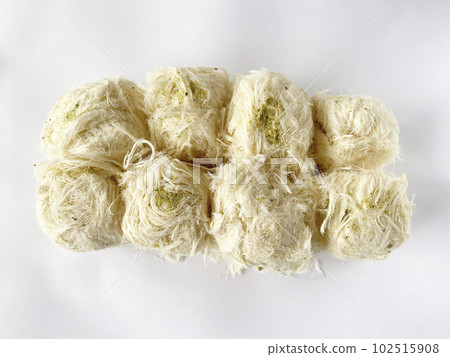 Turkish traditional dessert Cotton Candy. Turkish name pismaniye. Or dragon's beard or light halva 102515908