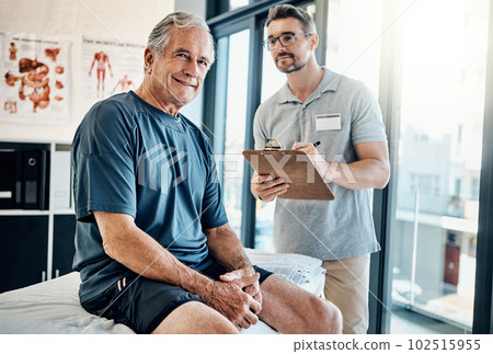 My recovery is all thanks to him. Portrait of a mature man smiling during a consultation with his physiotherapist in the rehabilitation center. My recovery is all thanks to him. Portrait of a mature man smiling during a consultation with his physiotherapist in the rehabilitation center. 102515955