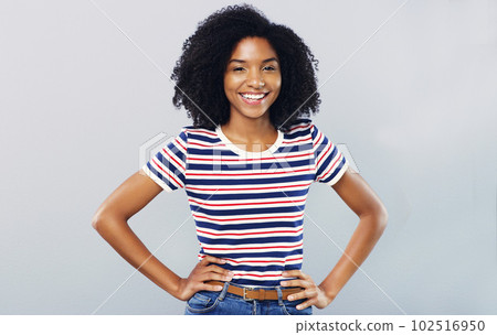 Get moe out of life with a positive mindset. Studio shot of a confident young woman posing against a grey background. 102516950