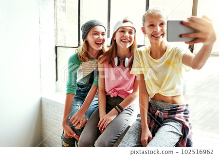 The dancers selfie. young girls taking a selfie in a dancing studio. 102516962