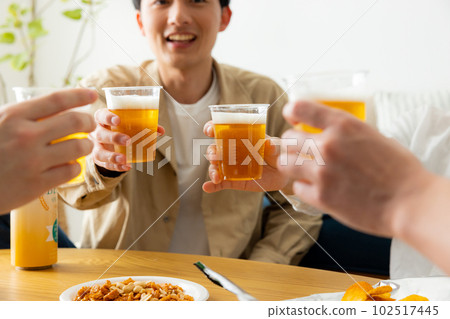 Drinking at home man 102517445