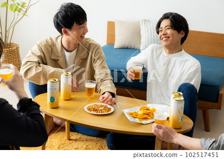 Drinking at home man Drinking at home man 102517451