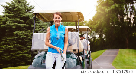 Ive arrived at the back nine. Cropped portrait of an attractive young woman leaning against a golf cart on a golf course. Ive arrived at the back nine. Cropped portrait of an attractive young woman leaning against a golf cart on a golf course. 102517956