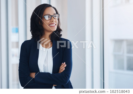 Always remind yourself about your goals. a young businesswoman looking thoughtful in an office. 102518043