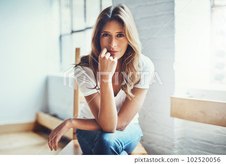 Make space in each day to relax. Portrait of an attractive young woman relaxing at home. Make space in each day to relax. Portrait of an attractive young woman relaxing at home. 102520056
