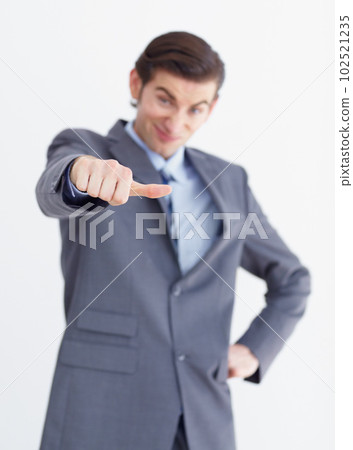 Hand, vote and thumbs down by unhappy business man in studio with bad news or disappointed on white background. review, fail and male person with negative, feedback and finger emoji for rejection Hand, vote and thumbs down by unhappy business man in studio with bad news or disappointed on white background. review, fail and male person with negative, feedback and finger emoji for rejection 102521235