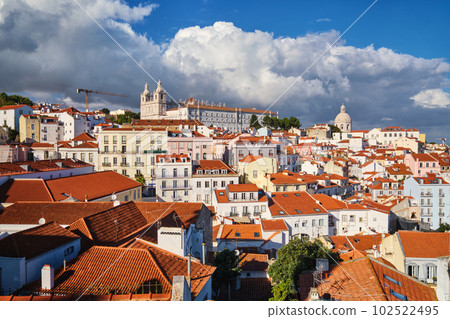 View of Lisbon famous postcard iconic view from Miradouro de Santa Luzia tourist viewpoint over Alfama old city district. Lisbon, Portugal. 102522495