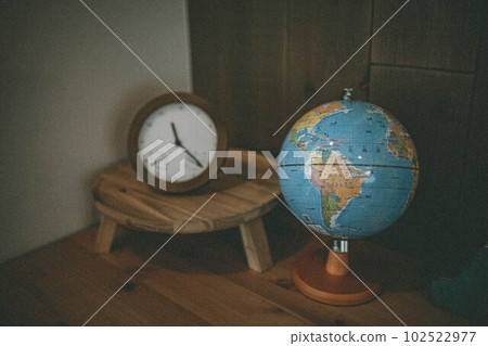 globe, clock and desk 102522977