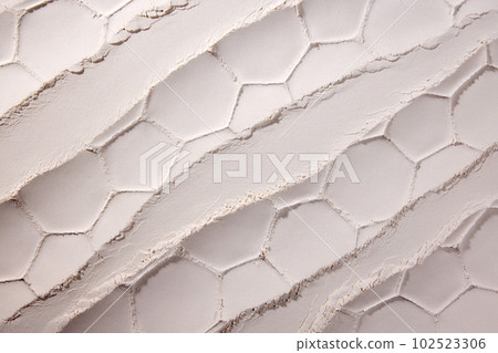 Textured image of pink sand, powder. Abstract design for wallpaper, background, banner. Circular imprints. Textured image of pink sand, powder. Abstract design for wallpaper, background, banner. Circular imprints. 102523306