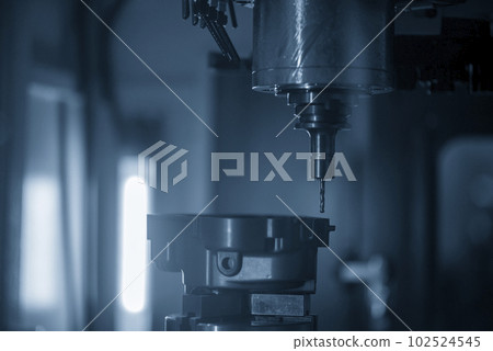 The CNC milling machine milling process at  aluminum automotive part. 102524545