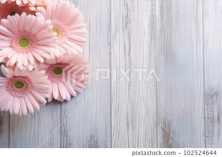 Pink delicate gerbera daisy bouquet on white wooden background, copy space for text. Floral greeting card for Mother Day or Valentines, Wedding invitation mock-up. Generative AI. 102524644