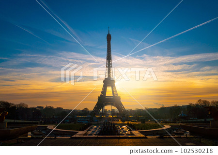 Beautiful view of famous Eiffel Tower in Paris at sunrise time in winter, France. Paris Best Destinations in Europe. Beautiful view of famous Eiffel Tower in Paris at sunrise time in winter, France. Paris Best Destinations in Europe. 102530218