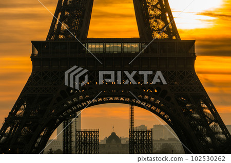 Silhouettel view of famous Eiffel Tower in Paris at sunrise time in winter, France. Paris Best Destinations in Europe. 102530262