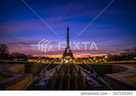 Beautiful view of famous Eiffel Tower in Paris before sunrise time in winter, France. Paris Best Destinations in Europe. 102530265