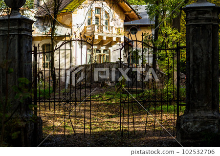 Scenery in the form of an ancient gate with columns against the backdrop of the Turliki estate, Obninsk, Russia 102532706