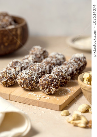 Energy balls. No cook energy protein, bites made from coconut flakes, oats, dried fruits and nuts. Energy balls. No cook energy protein, bites made from coconut flakes, oats, dried fruits and nuts. 102534074
