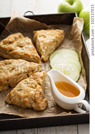 Yogurt apple scones with cider glaze 102537015