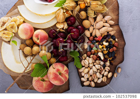 Fresh fruit and nut platter 102537098
